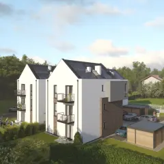 Nowoczesny dom z keramzytu, otoczony zielenią. Wady? Może brak mu tradycyjnego uroku, ale z pewnością jest funkcjonalny.